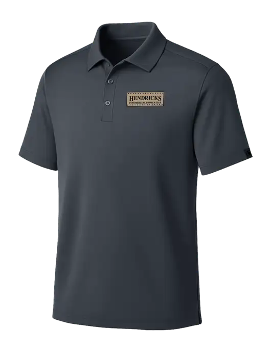 OGIO Dark Grey Framework Polo w/Hendricks Commercial Properties Logo